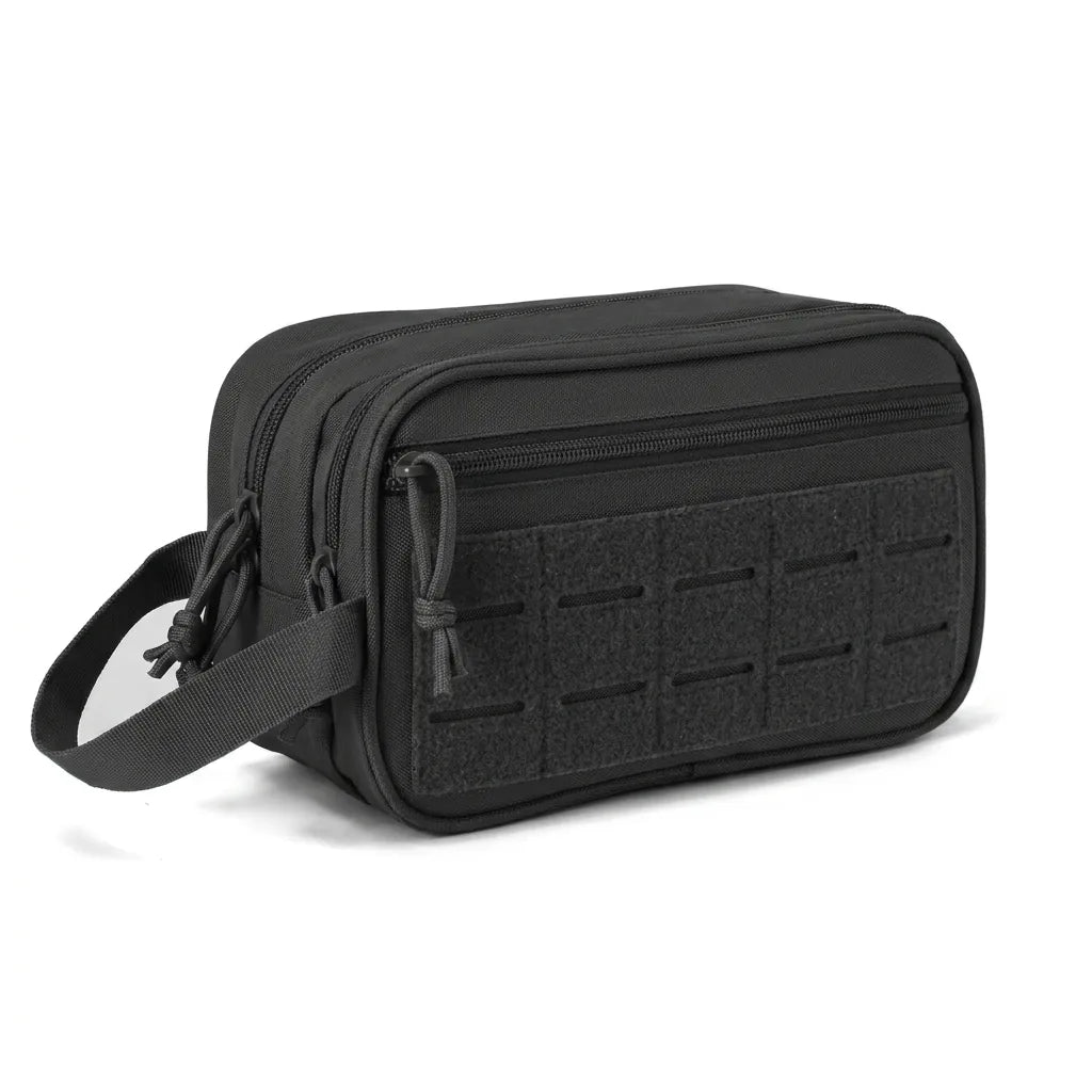 BikeBag Dopp Kit in black, angled view showing depth and carry handle