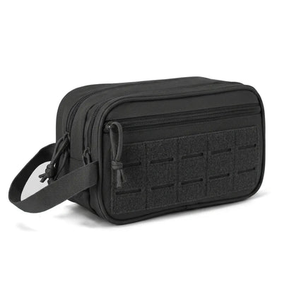 BikeBag Dopp Kit in black, angled view showing depth and carry handle
